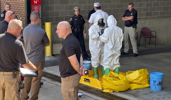 A hazmat crew from the National Guard's Civilian Support Team investigates after a suspicious package was delivered to election officials at the Missouri Secretary of State's Jefferson City, Mo., office on Tuesday Sept. 17, 2024. (AP)